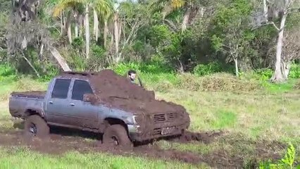 Toyota gets stuck in mud, Jeep makes it much worse