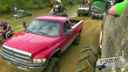 Army Truck Pulled Out of Mud by Toyota