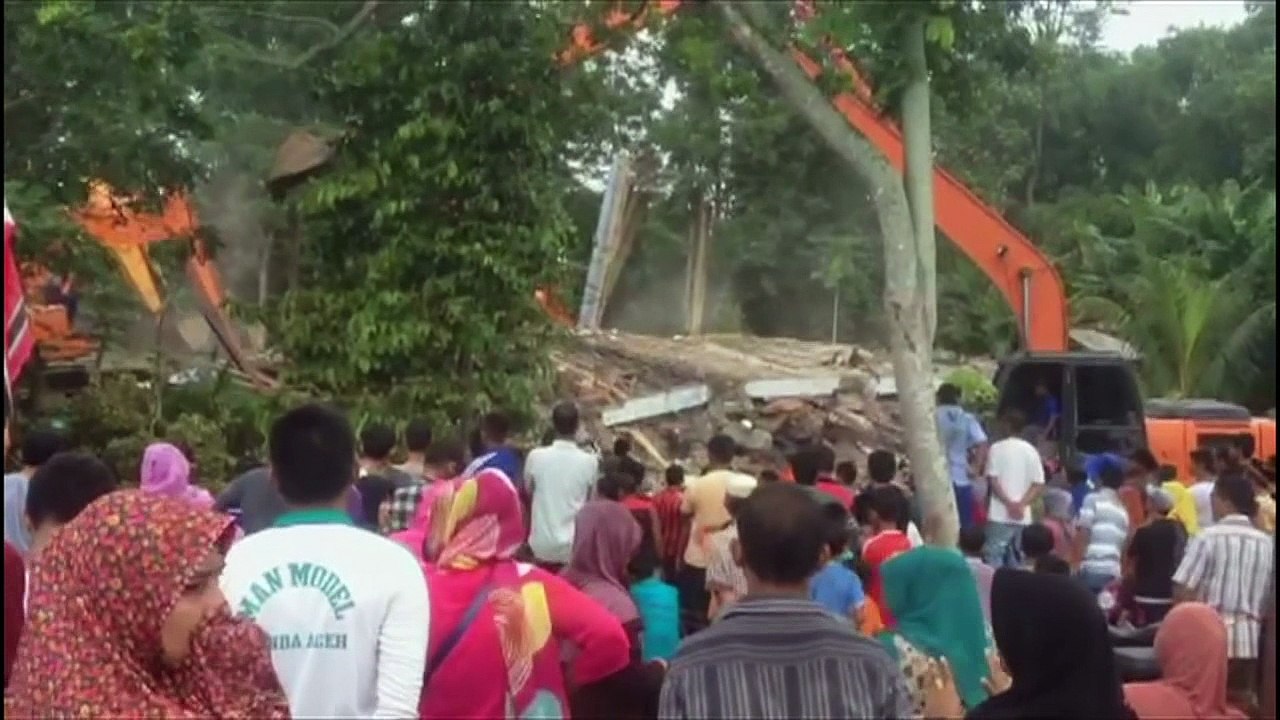 At least 50 killed as earthquake rocks Indonesia