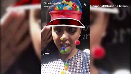 Christina Milian wears sheer mesh dress at New York event