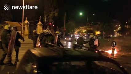 Molotov cocktails 'launched' at police as riots break out in Greece