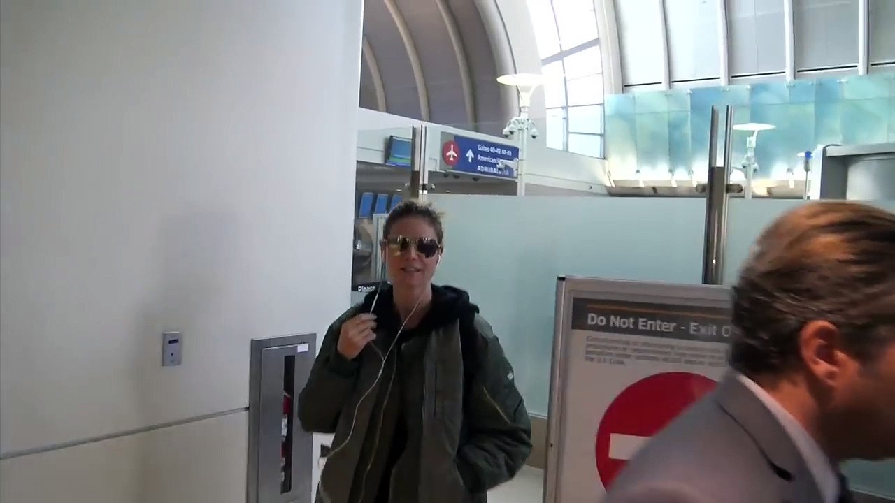 Nudist Heidi Klum Is All Bundled Up At LAX