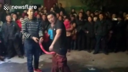 Chinese man puts one-metre-long firecracker between his legs and lights it