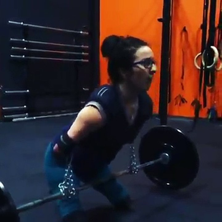 handicapt girl lifting weight