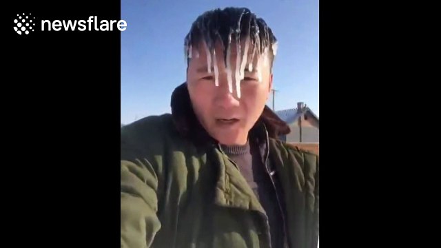 Man's hair freezes as northern China is hit by polar tempartures
