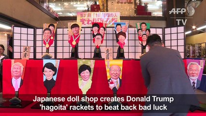 Japan shop hopes to ward off bad luck with Trump-faced rackets