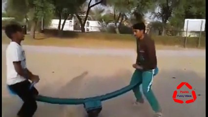 Pashto Funny Videos Funny Pathans in the Park on seesaw