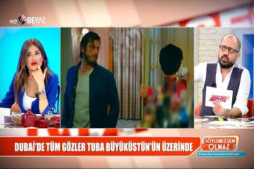 Tuba Büyüküstün, kırmızı halıda yürürken başını örttü