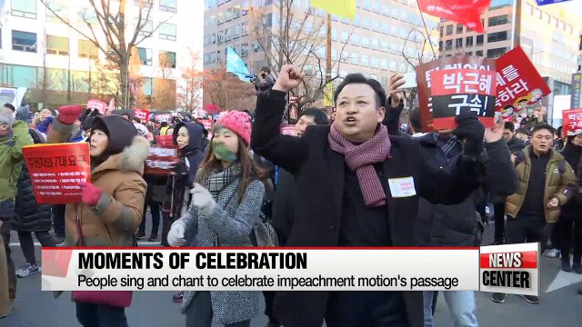 People gather outside the National Assembly to celebrate impeachment motion's passage