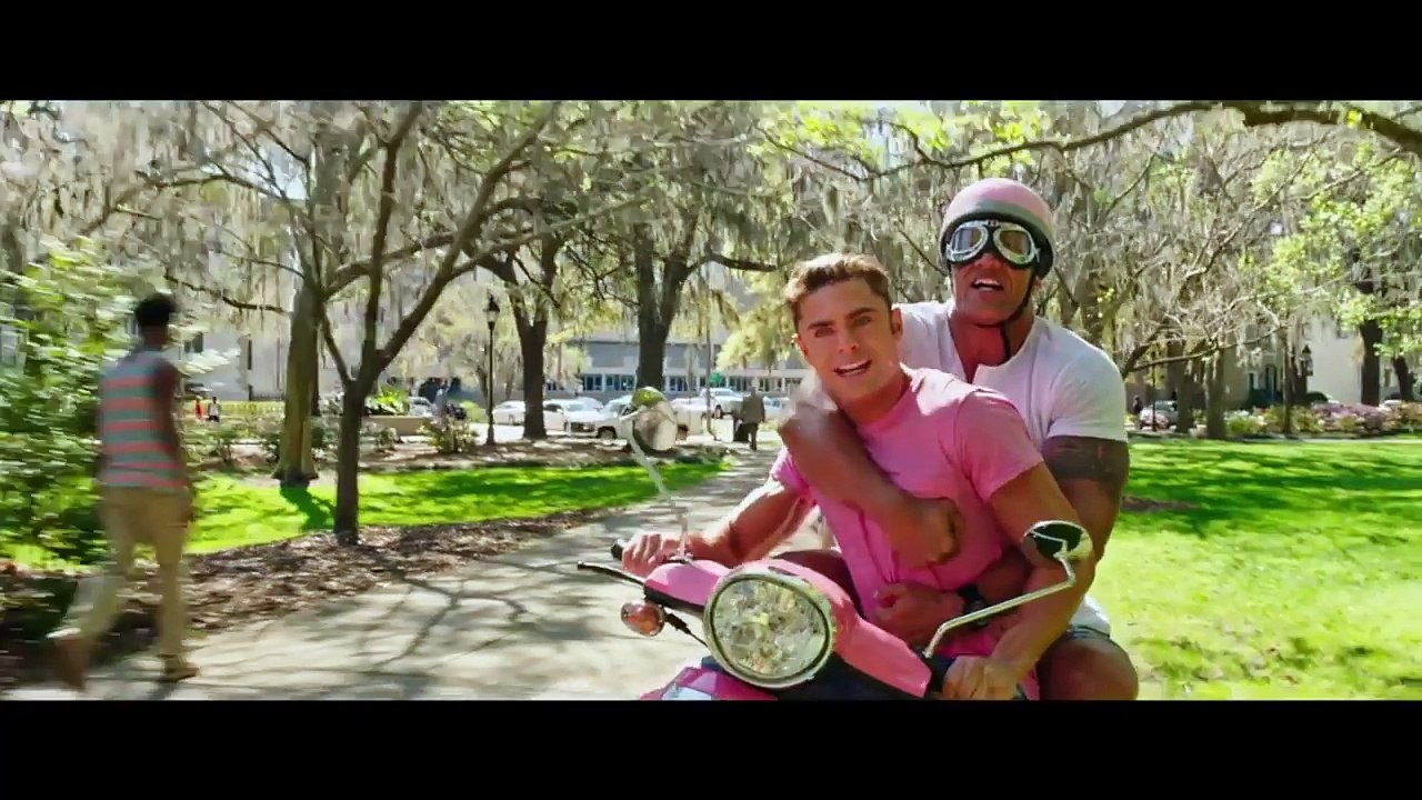 First Baywatch Movie Trailer Delivers SHIRTLESS Zac Efron & The Rock