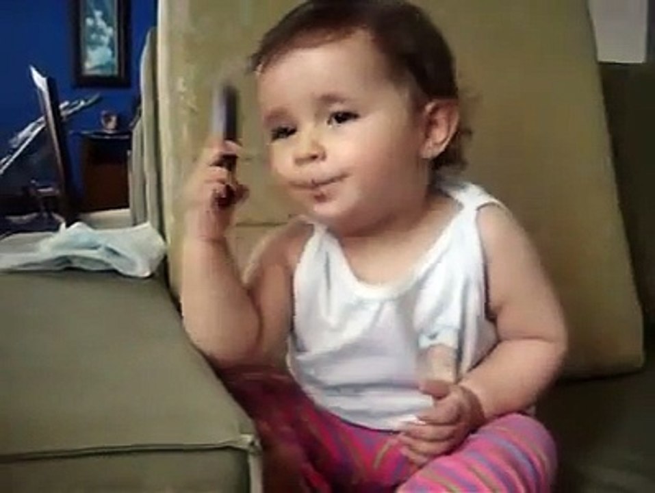 Baby talks into cellphone