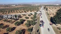 Сирия: выход мирных жителей из зоны боевых действий в Алеппо. Съемка с дрона.