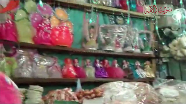 .اقبال ضعيف علي محال حلوي المولد بأسواق أسوان