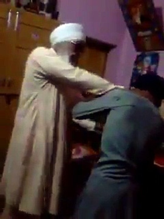 Baba beating child