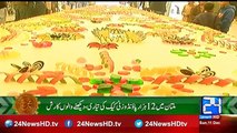 Preparation of 12 thousand pound cake weighing in Multan for Eid Milad un Nabi, onlookers rush