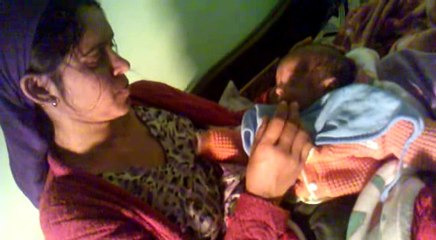 mother baby feeding the  milk