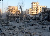 Бойцы сирийской армии ведут бои с боевиками в районе Кварталы Карм Даада в Алеппо