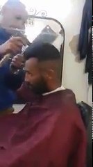 hair cut using a large knife
