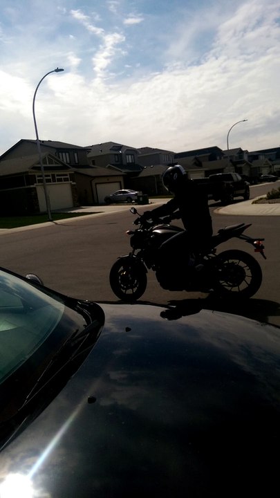 Motorcycle vs Garage