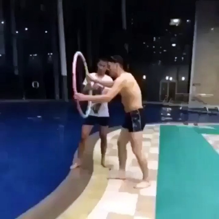 funny boys play with ring