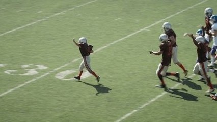 Un enfant malade marque un touchdown