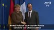 Merkel, Hollande back extended Russia sanctions over Ukraine