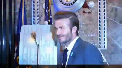 David Beckham lights the Empire State Building's tower lights blue to celebrate UNICEF's anniversary