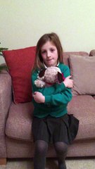 Little girl overwhelmed by new puppy surprise