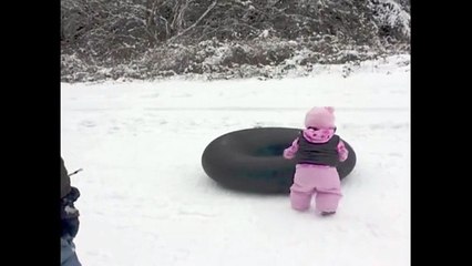 Child playing with snow.