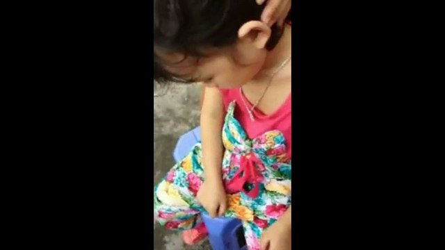 Chinese Ear Cleaning (31) Helping a young girl to remove a large piece of ear wax