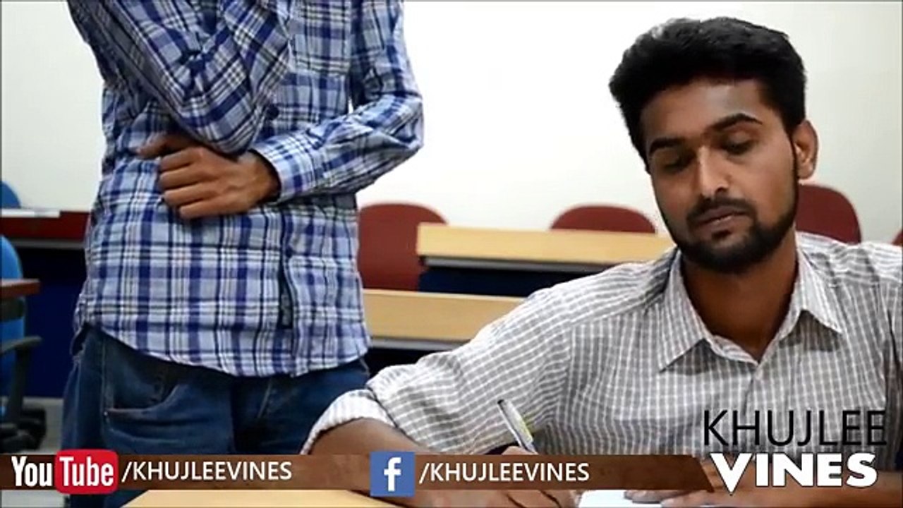 student cheating in exam hall