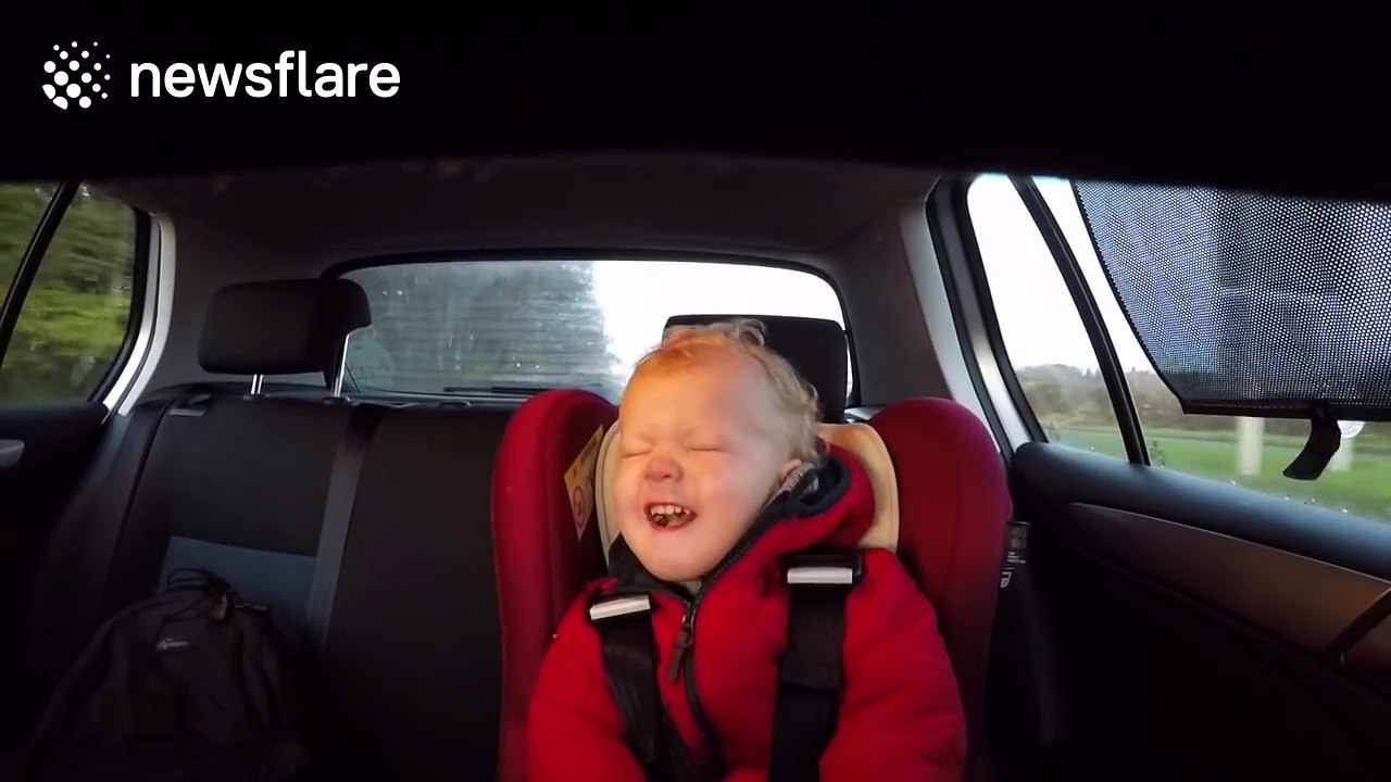 Boy, 2, head bangs along to rock music