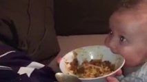 Hungry baby super excited for spaghetti dinner