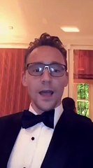 Tqom Hiddleston eating donuts