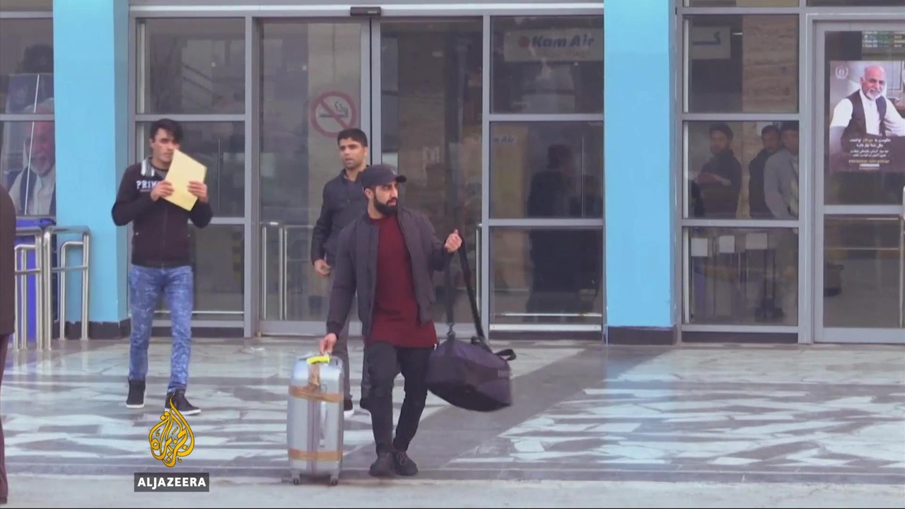 Deported Afghan refugees return from Germany