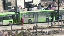 Hundreds leave Aleppo under evacuation deal