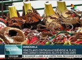 Venezolanos continúan con el canje de billetes de 100 Bolívares