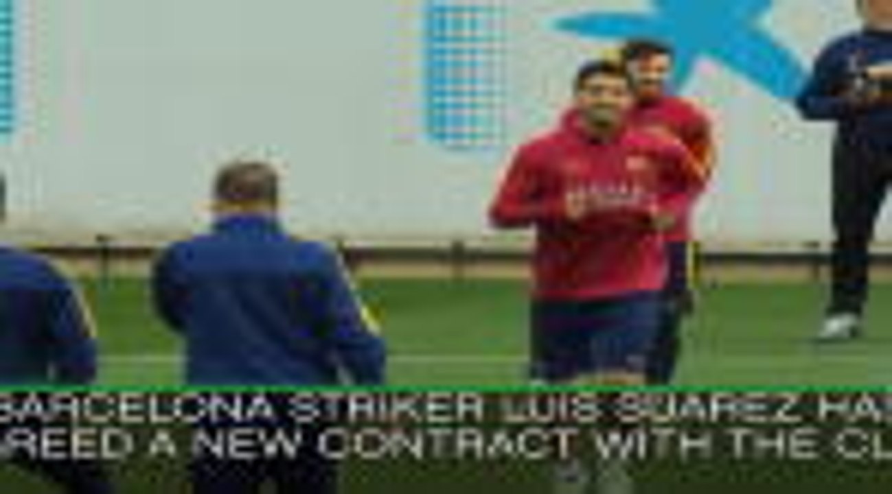 Suarez agrees new Barca deal
