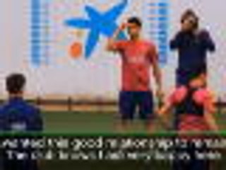 Suarez happy to extend Barca stay