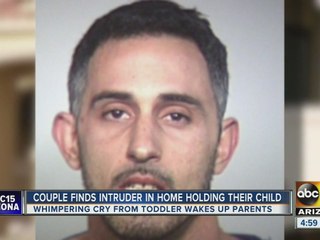 Man found holding baby in Tempe house