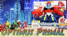 Transformers Optimus Primal with Batman and Superman Optimus Prime Transforms into Dinosaur