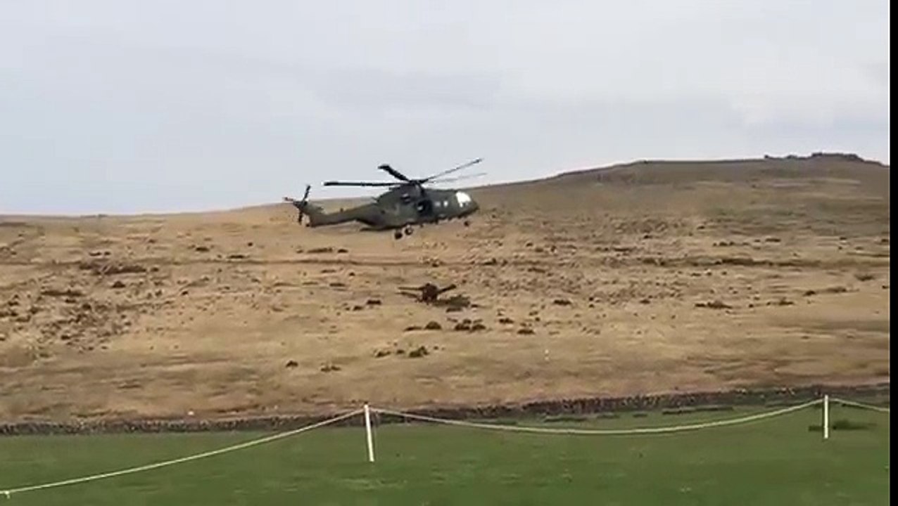 Merlin Helicopter Takes Out A Row Of Porta-Potties