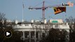 Greenpeace activists hang giant protest banner near White House