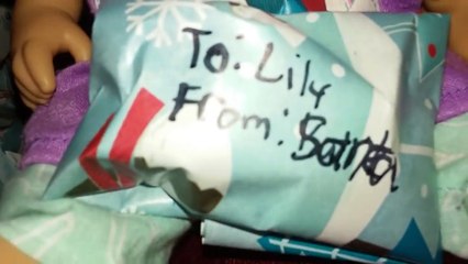 Lily secretly opens her christmas present!
