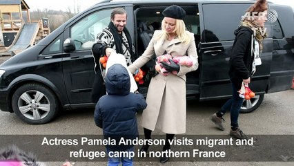 Pamela Anderson visits French migrant and refugee camp