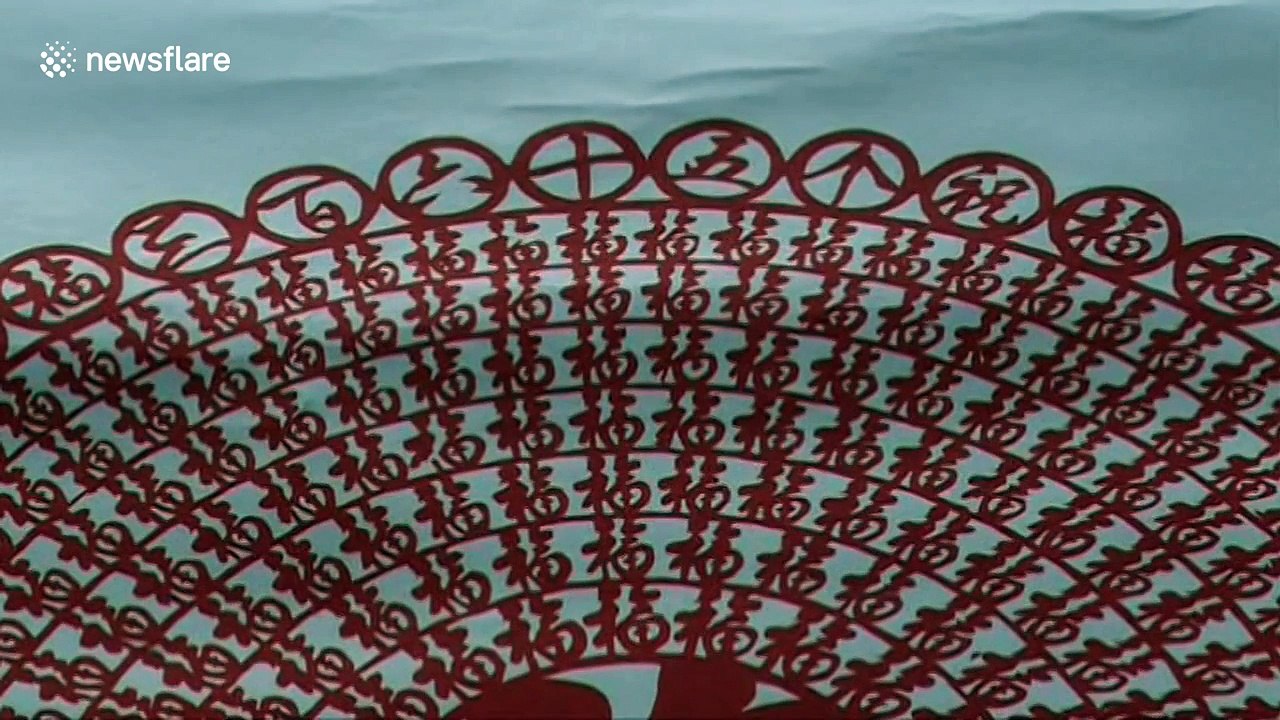 Man cuts 365 Chinese characters out of one piece of paper to give message of 'blessing'