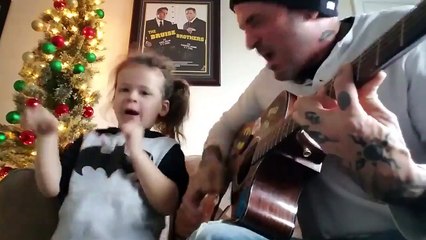 Reprise explosive d'un chant de Noël par un père et sa fille