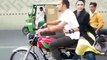 Pakistani Boy With A Girl Doing One Wheeling On Bike - Video