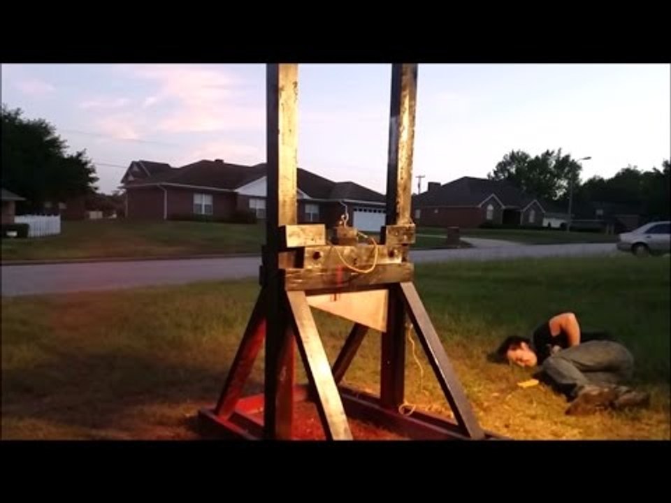 Guillotine Cuts Open Paint Can Causing Unexpected Result