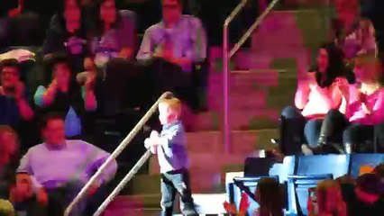 Bimbo stands up during a concert